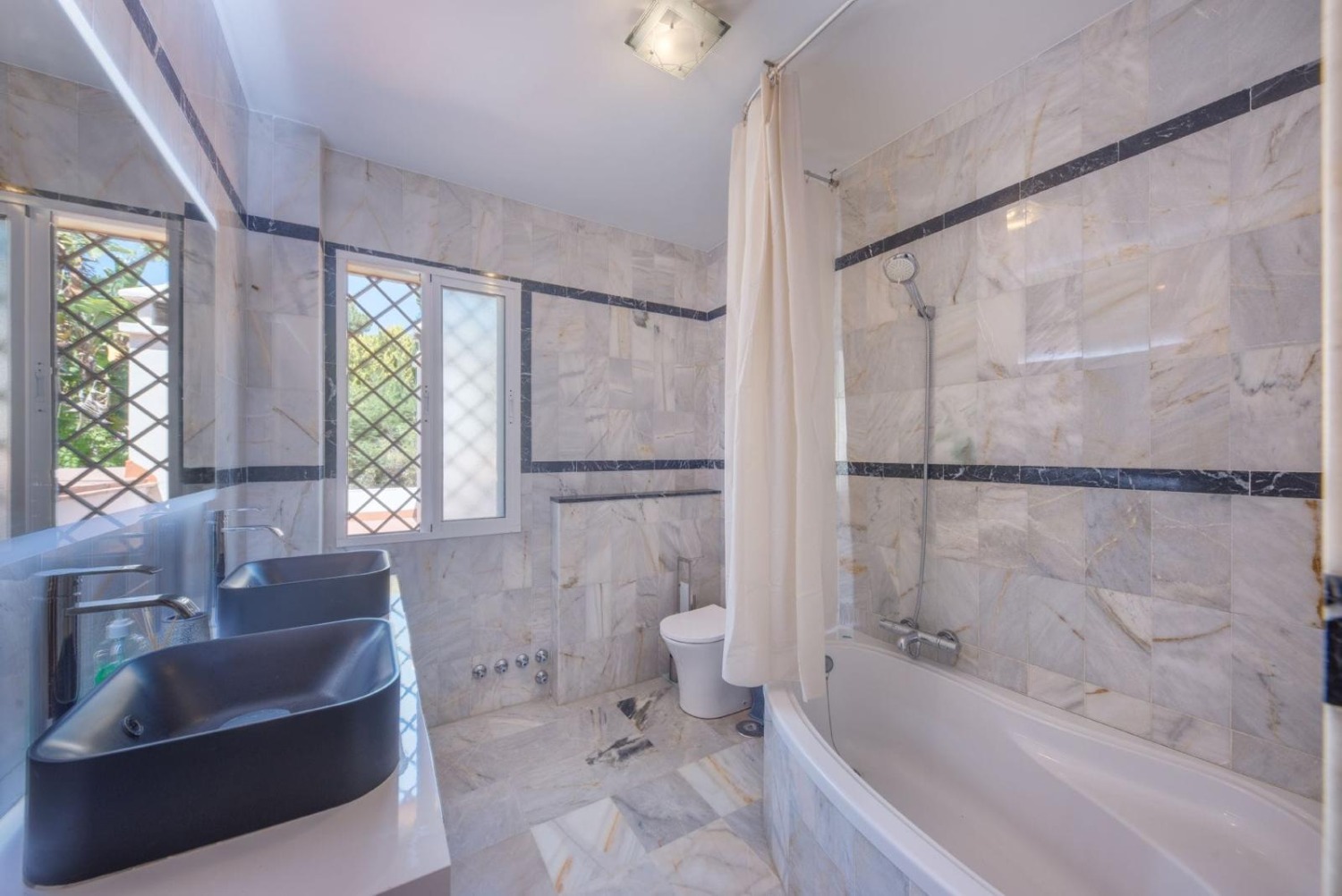 9 double bedrooms - 7 bathrooms - Sleeps up to 20 people - Marbella East